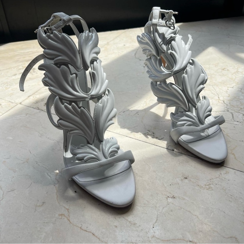 Guiseppe zanotti wing heels in white